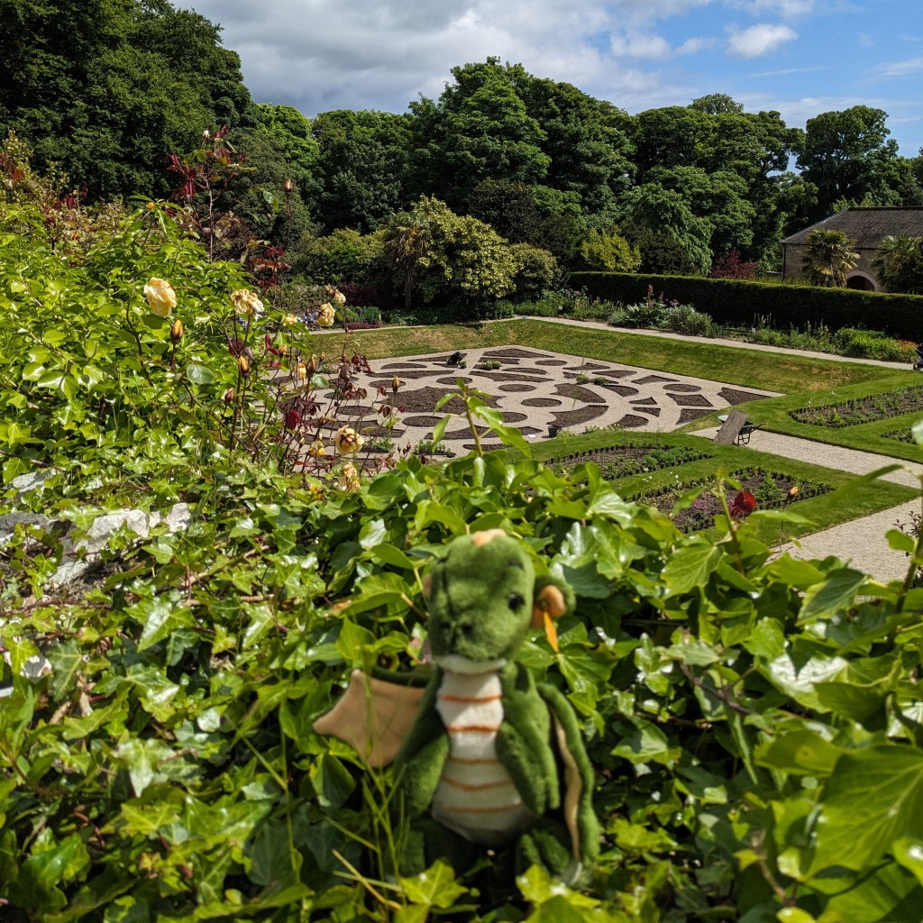 George hiding in the greenery at Castle Ward